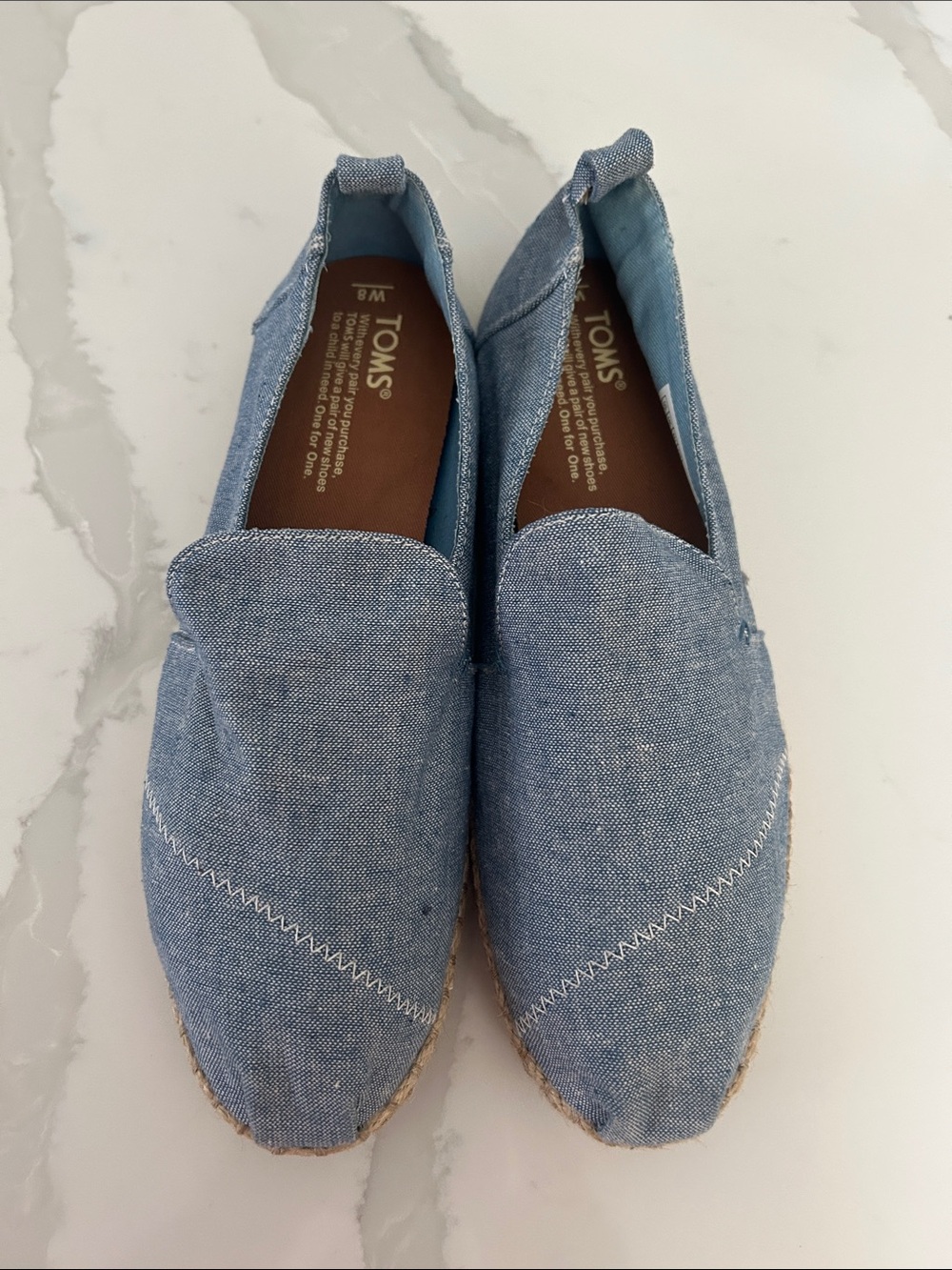 TOMS Chambray Blue Canvas Slip-Ons